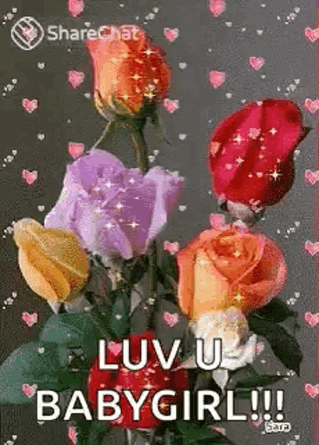 a bunch of roses in a vase with the words `` luv u babygirl '' written on them .