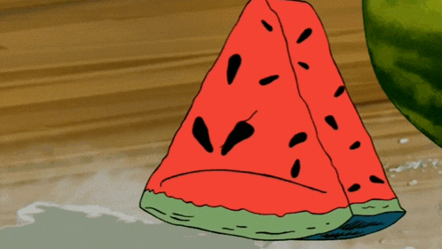 a watermelon with two slices cut out of it on a wooden table