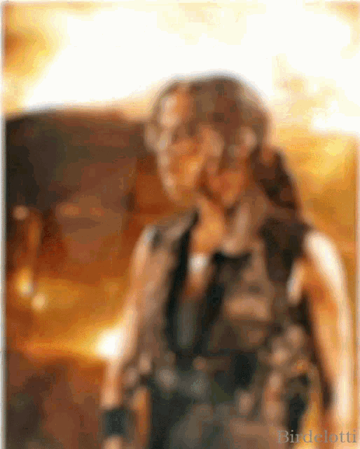 a blurry picture of a woman with the word birdelotti on the bottom right