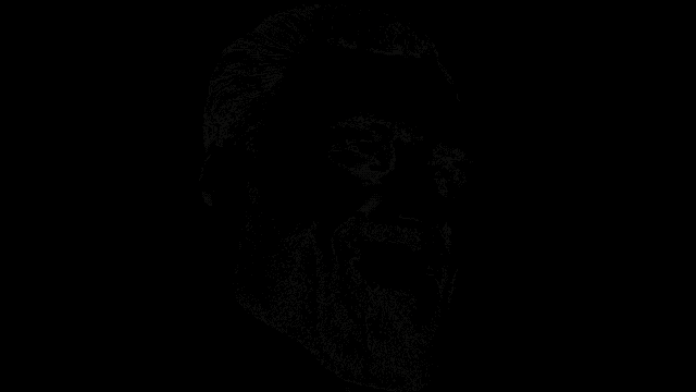 it is a black and white photo of a man 's torso and arms .