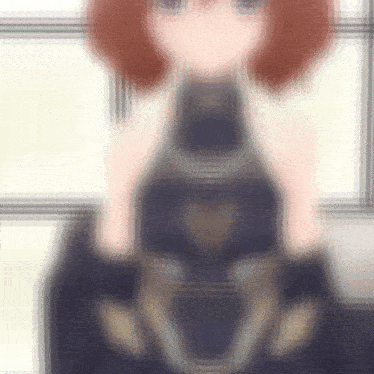 a blurry picture of a girl with red hair wearing a black dress