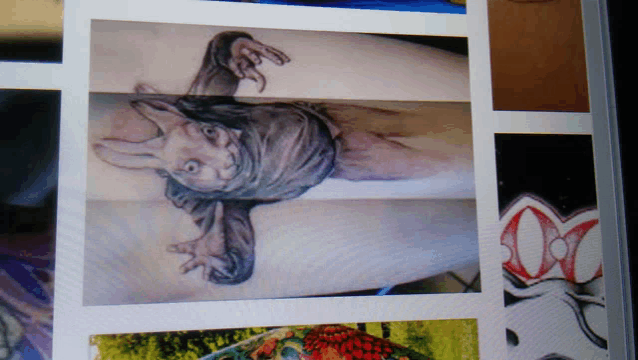 a picture of a tattoo of a rabbit on a persons arm