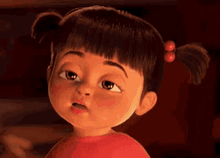 a close up of a cartoon girl with pigtails and a red shirt