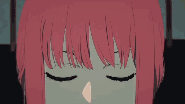 a close up of a girl 's eyes with red hair and yellow eyes