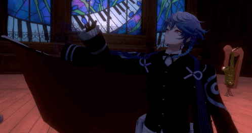 a man in a black suit stands in front of a stained glass piano