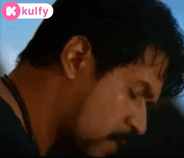 a close up of a man 's face with a k kulfy logo
