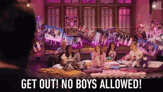 a group of girls are sitting on a bed with the words get out no boys allowed on the bottom
