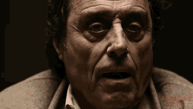 a close up of a man 's face with the words american zeros on the bottom right