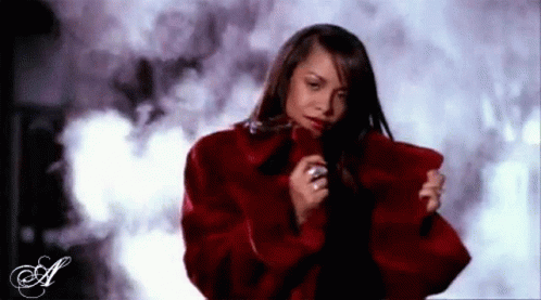 Aaliyah Red Coat GIF - Aaliyah Red Coat Smoke GIFs
