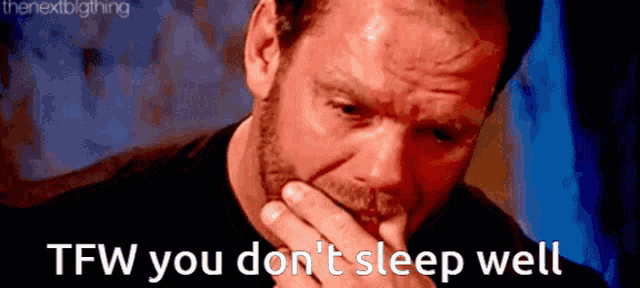 a man covering his mouth with his hand and the words tfw you do n't sleep well