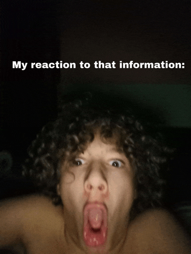 a man with curly hair making a funny face with the words my reaction to that information