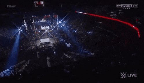 an aerial view of a wrestling arena with the words raw on the bottom