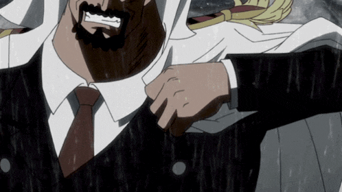 a man in a suit and tie is holding another man 's hand