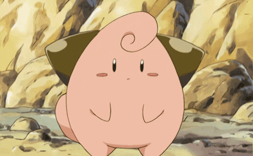 a pink cartoon character with a swirl on his head