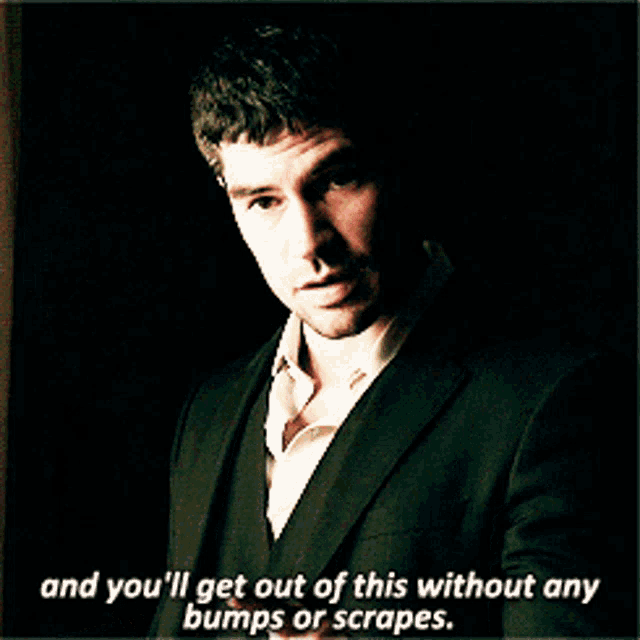 a man in a suit says " and you 'll get out of this without any bumps or scrapes . "