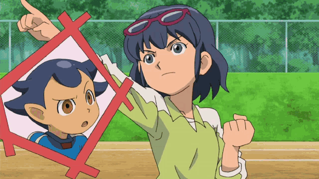 a cartoon girl is pointing at a picture of a boy