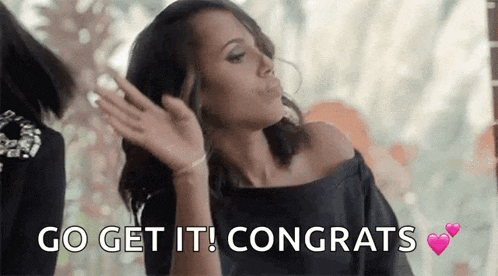 a woman is blowing a kiss and saying go get it congrats