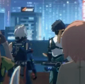 a group of people standing in front of a building with a sign that says ' a ' on it .