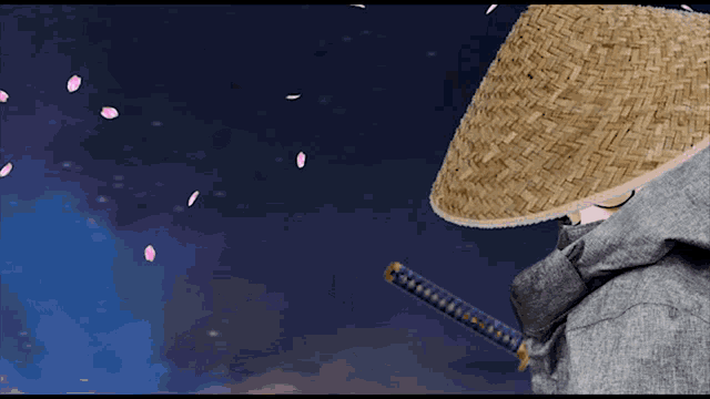 a man in a straw hat holds a sword