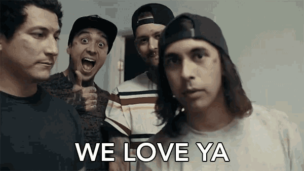 a group of men are standing next to each other with the words we love ya on the bottom .