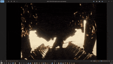 a computer screen shows a silhouette of a man holding a spear