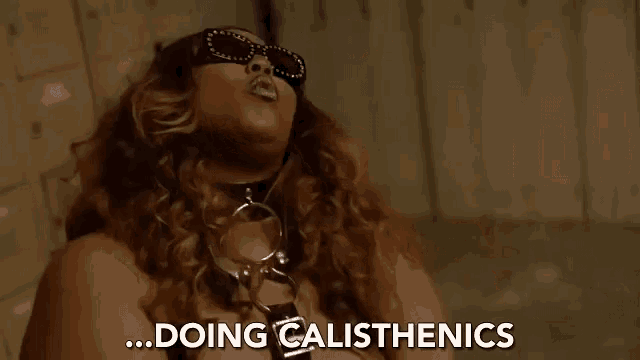 a woman wearing sunglasses and a headband is talking about doing calisthenics .