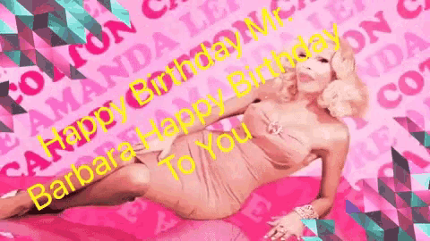 a woman in a pink dress is laying on a pink surface with the words happy birthday to you written on it