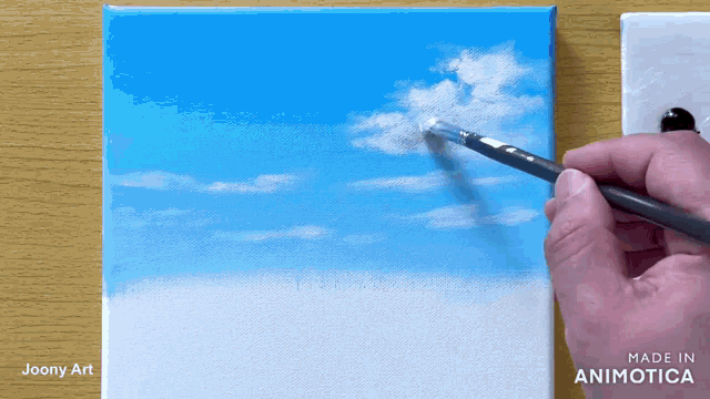 a person is painting a blue sky with white clouds on a canvas made in animatica