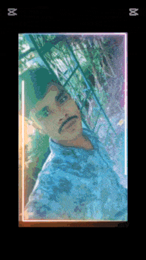 a man with a mustache is taking a selfie with a neon frame around him