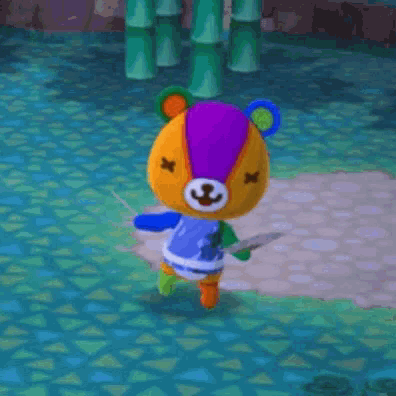 a colorful teddy bear is holding a knife in his hand