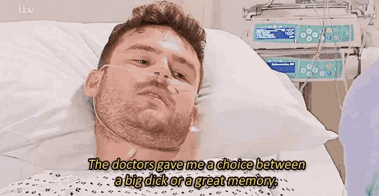 a man in a hospital bed with an oxygen mask on his face .
