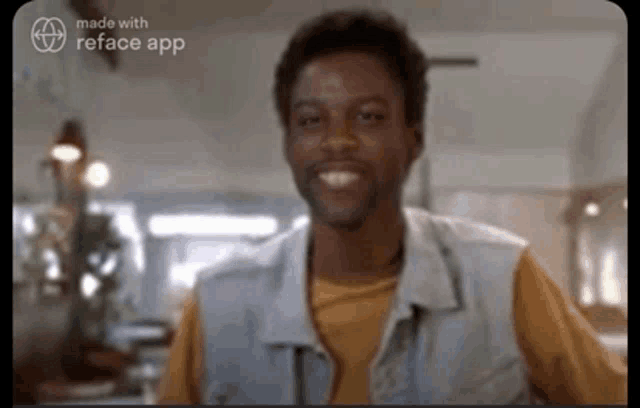 a man in a yellow shirt is smiling in front of a sign that says reface app