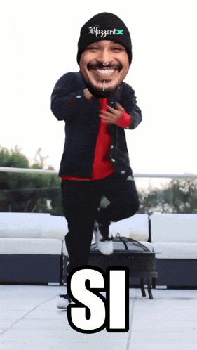 a man with a beanie that says wizzard on it is dancing