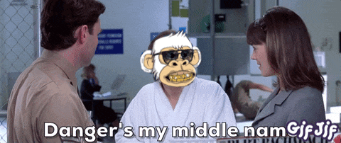 a man and a woman are talking and the man has a monkey on his head and the woman says danger 's my middle nam