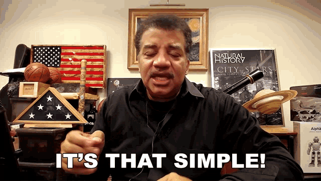 a man says it 's that simple in front of a natural history city stars poster