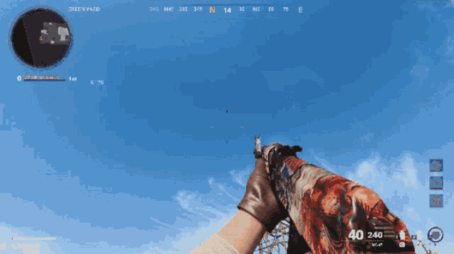 a person holding a gun with the number 40 on the left