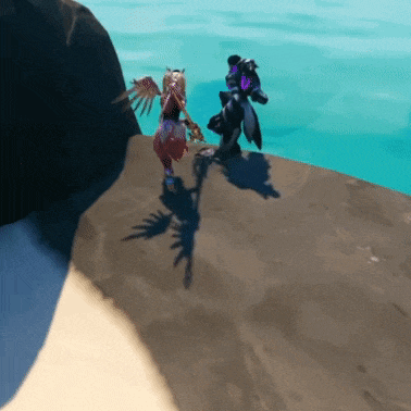 a shadow of a person is cast on a rock near a body of water .