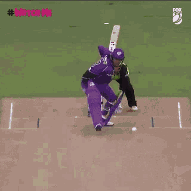 a female cricket player wearing a helmet and a jersey with the number 88 on it