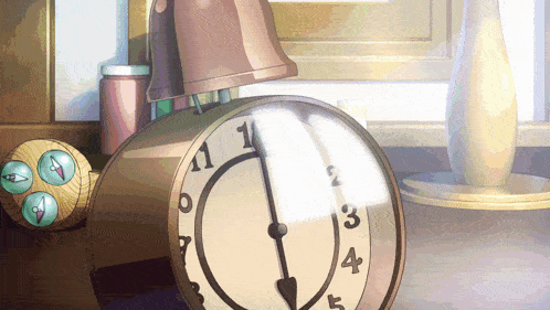 a clock on a table shows that it is almost 5:00