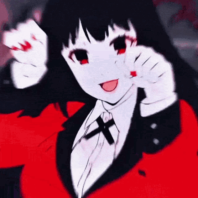 a girl with red eyes and black hair is wearing a red jacket and tie and making a funny face .