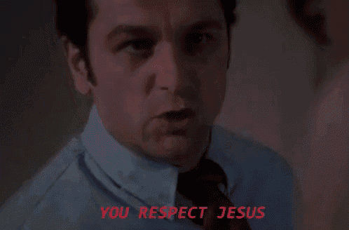 a man in a blue shirt and tie is saying you respect jesus