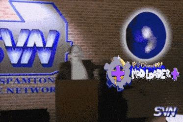 a man stands at a podium in front of a sign that says spamton network