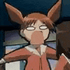 a cartoon character with bunny ears is making a funny face while holding a gun .