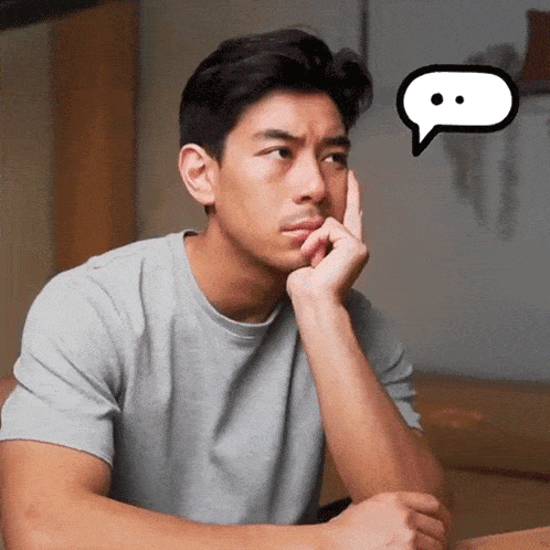 a man with his hand on his chin and a speech bubble behind him