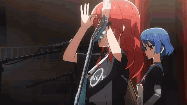 a girl with red hair is holding a blue guitar