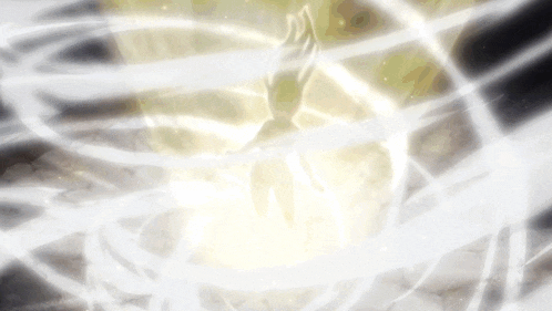 a person 's hand is reaching out towards a light