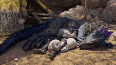 a person laying on the ground next to a giant bird