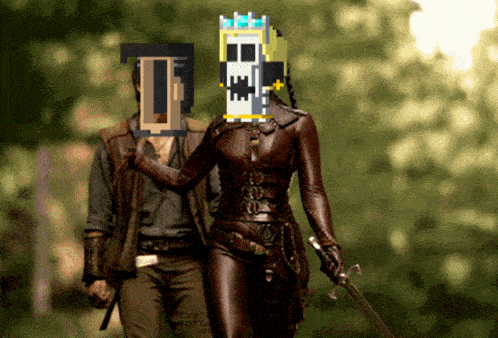 a man and a woman are walking in the woods with a pixelated face on the woman 's head