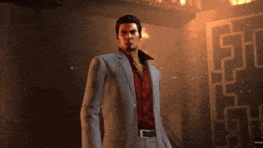 a man in a suit and red shirt is standing in front of a door that says sega on it