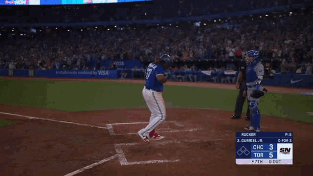 a baseball game is being played with a scoreboard that says rucker